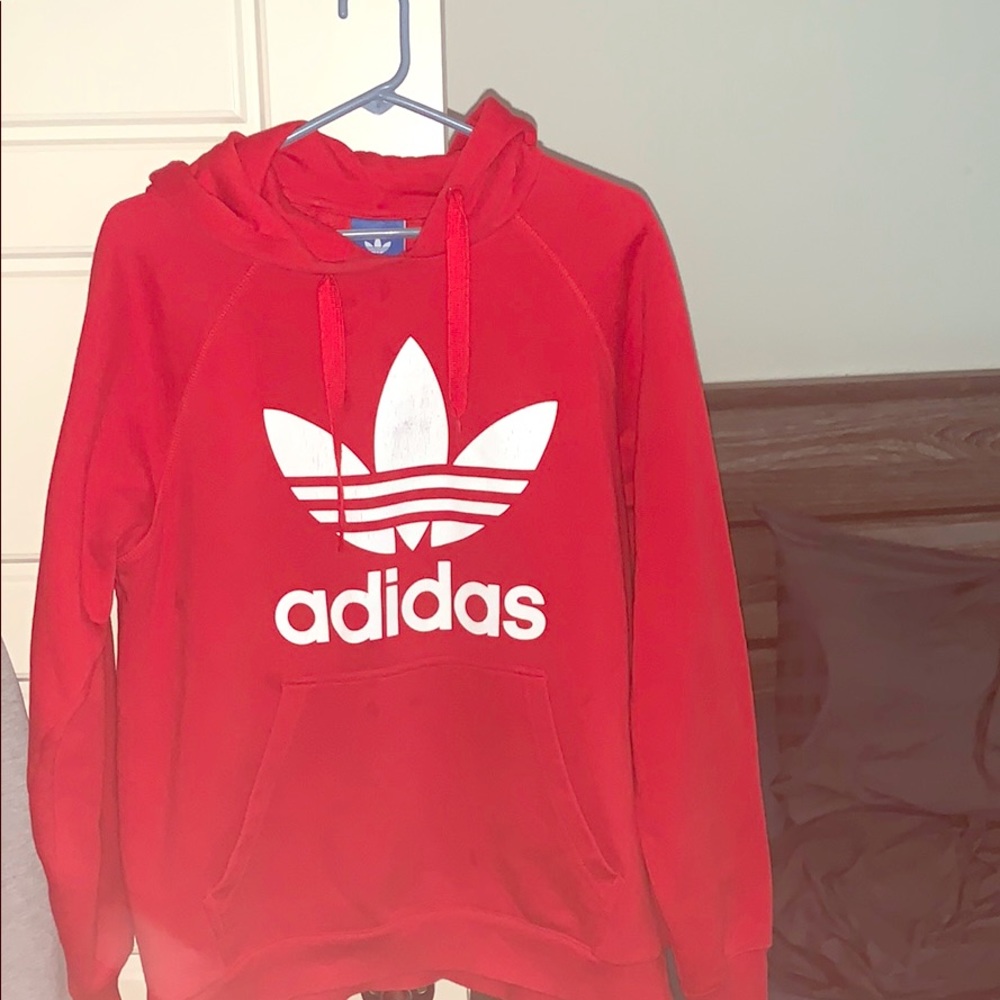 Selling a red adidas hoodie